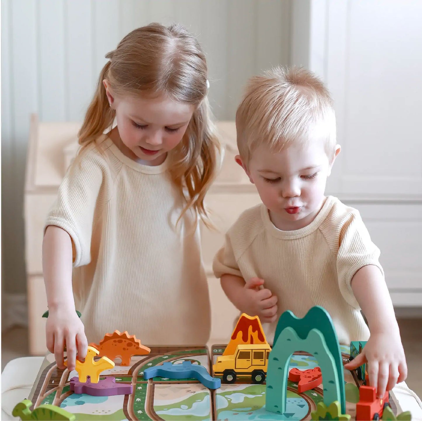 Tiny Land® Dinosaurs Wooden Take-Along Tabletop Train Set